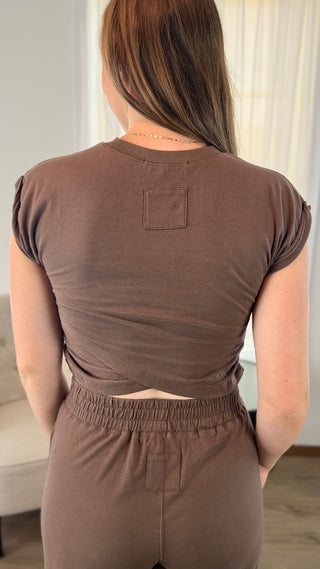 Woman wearing a brown matching set.