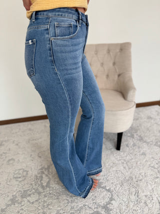 Woman wearing flare jeans.