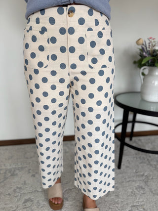 Blue and cream polka dot pants.
